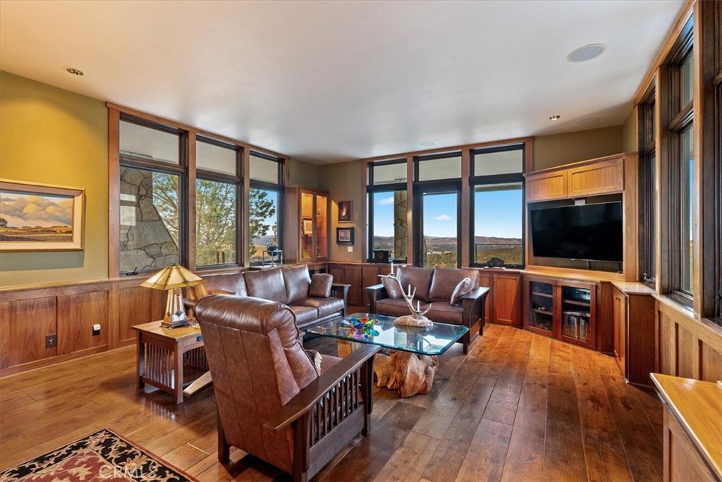76346 Bryson Hesperia Road Bradley, CA 93426 - Photo 7 of 58 a living room with furniture and a flat screen tv