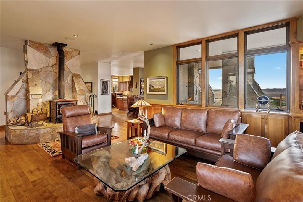 76346 Bryson Hesperia Road Bradley, CA 93426 - Photo 9 of 58 a living room with furniture and a large window