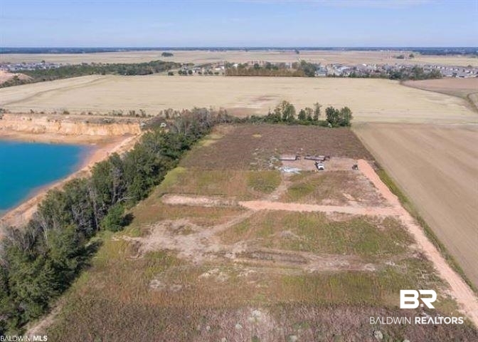 9465 Harry Morris Lane Foley, AL 36535 - Photo 4 of 7 Drone / aerial view featuring a water view and a rural view