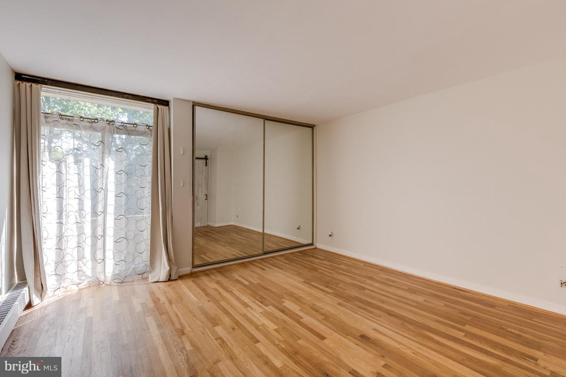 292 M Street Southwest, Unit 292 Washington, DC 20024 - Photo 11 of 29 Master bedroom with hardwood floors