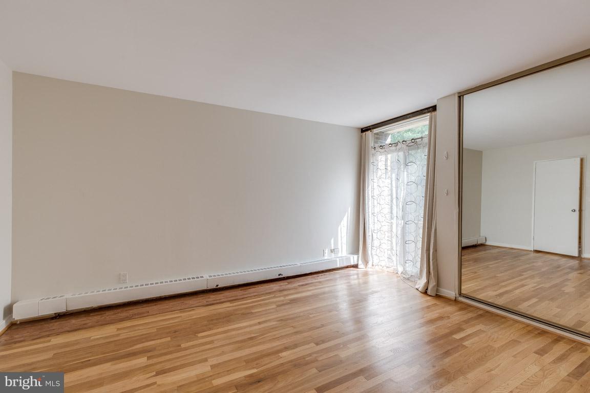 292 M Street Southwest, Unit 292 Washington, DC 20024 - Photo 15 of 29 Master bedroom with hardwood floors