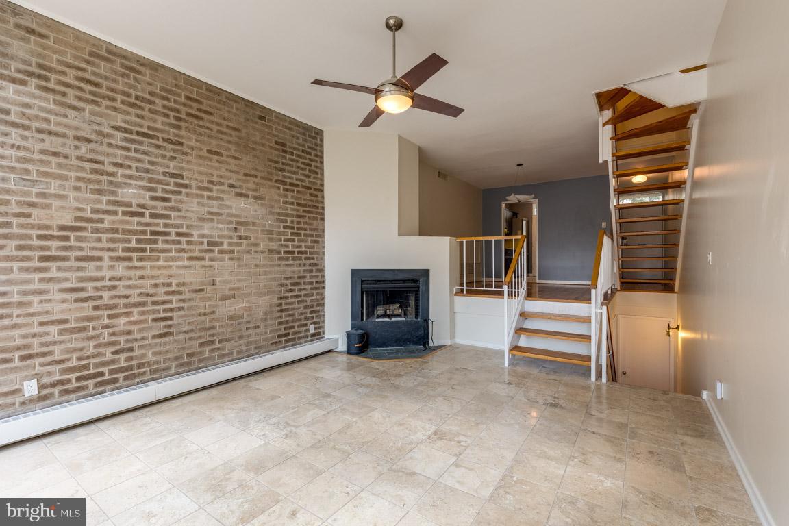 292 M Street Southwest, Unit 292 Washington, DC 20024 - Photo 21 of 29 Sunken living room facing dining room and kitchen
