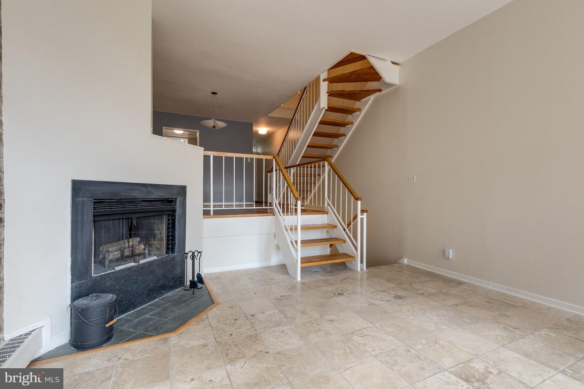 292 M Street Southwest, Unit 292 Washington, DC 20024 - Photo 22 of 29 Wood burning fireplace in LR for cozy winters