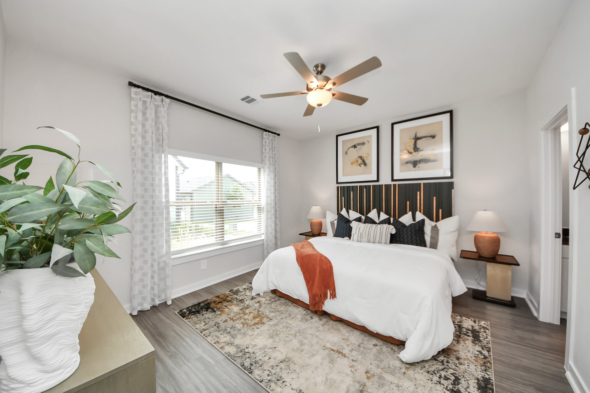 7711 Longmire Road, Unit 2 Conroe, TX 77304 - Photo 11 of 48 Primary Suite offers walk-closet,bath w/dual vanities&lux tub/shower.