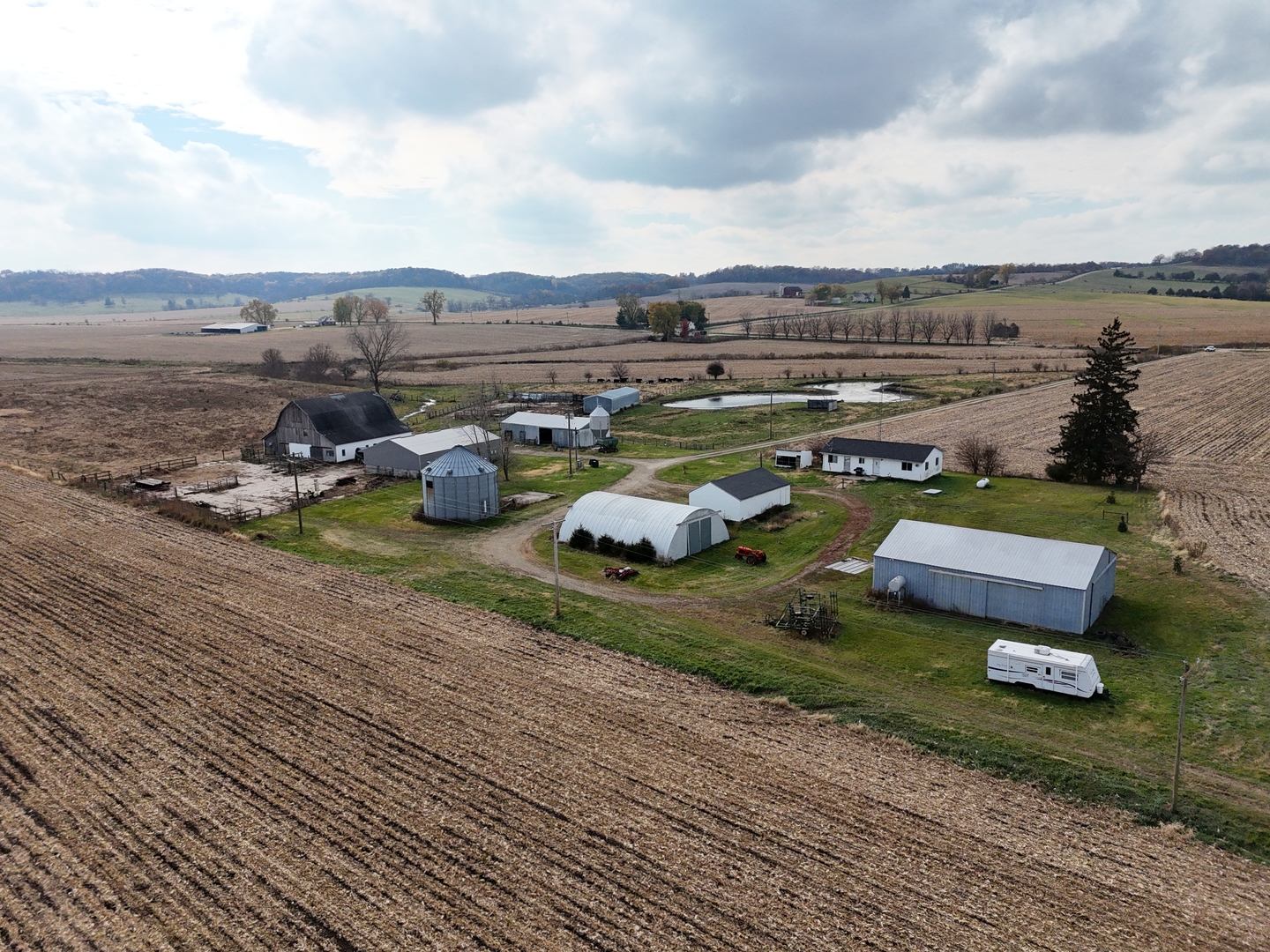 6977 South Elmoville Road Stockton, IL 61085 - Photo 11 of 14 a view of a lake with couches and city view
