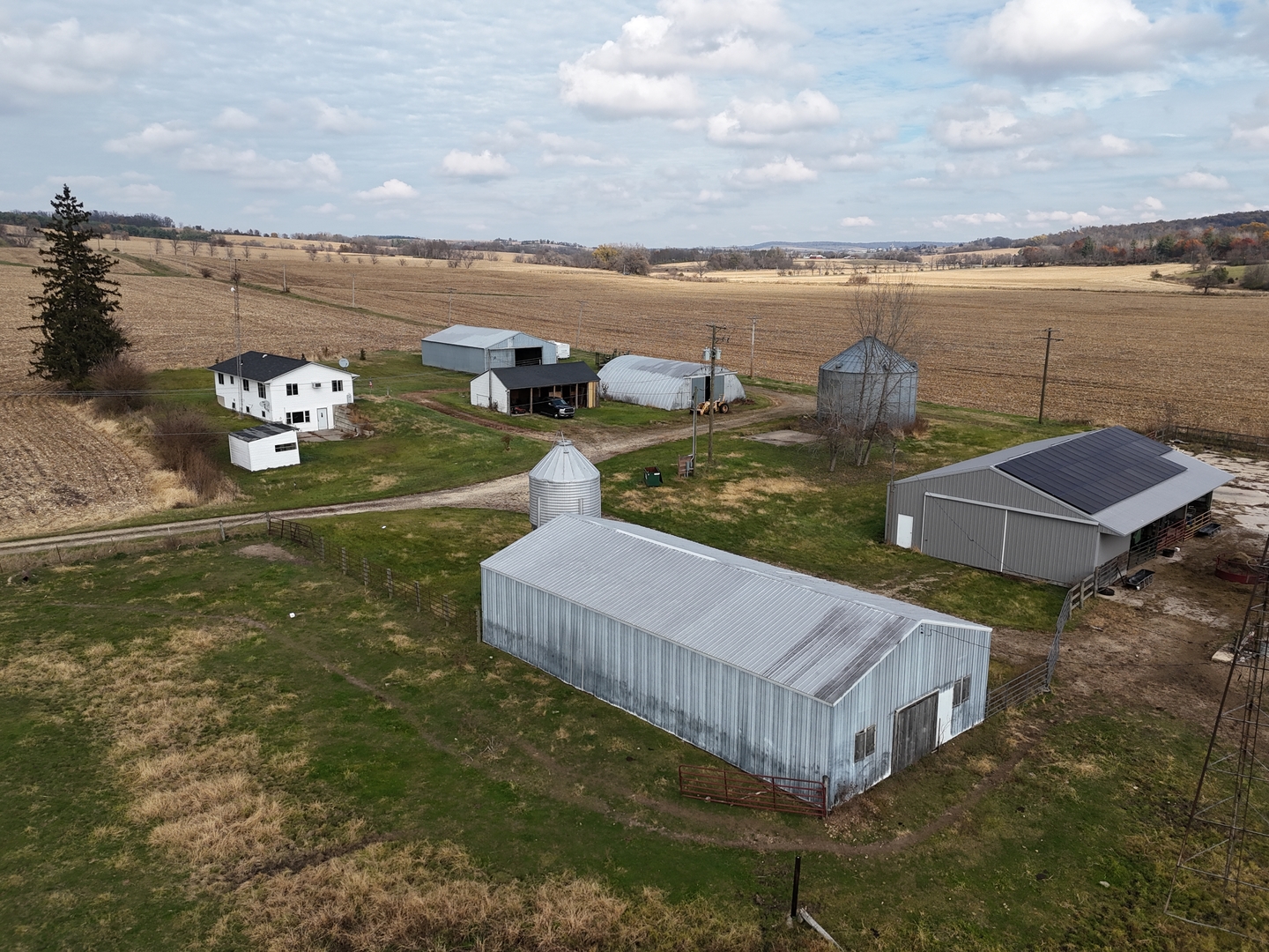 6977 South Elmoville Road Stockton, IL 61085 - Photo 14 of 14 a view of a lake with a nearby beach
