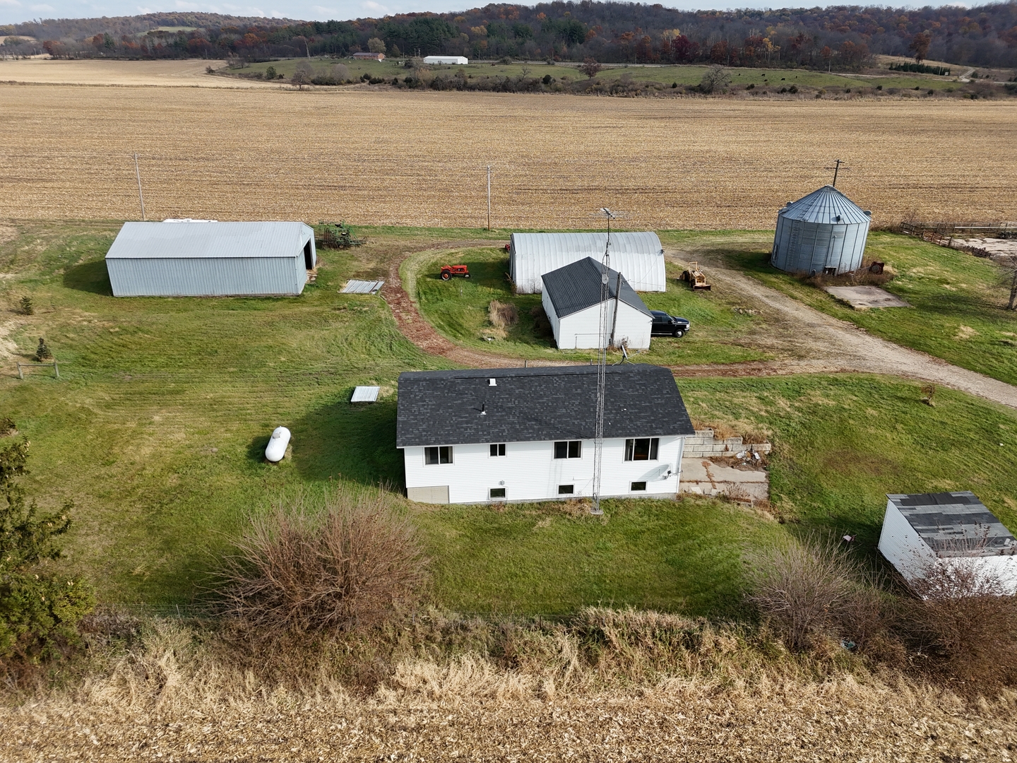 6977 South Elmoville Road Stockton, IL 61085 - Photo 8 of 14 a view of a lake with couches and wooden floor
