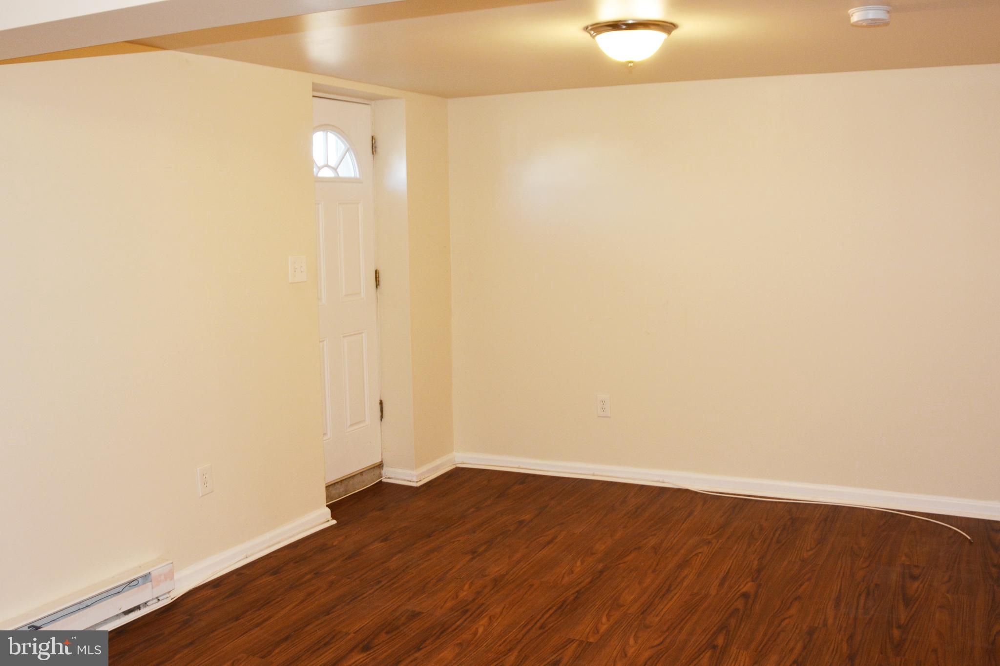 5890 Medora Road Linthicum Heights, MD 21090 - Photo 12 of 25 Lower Level Living Room