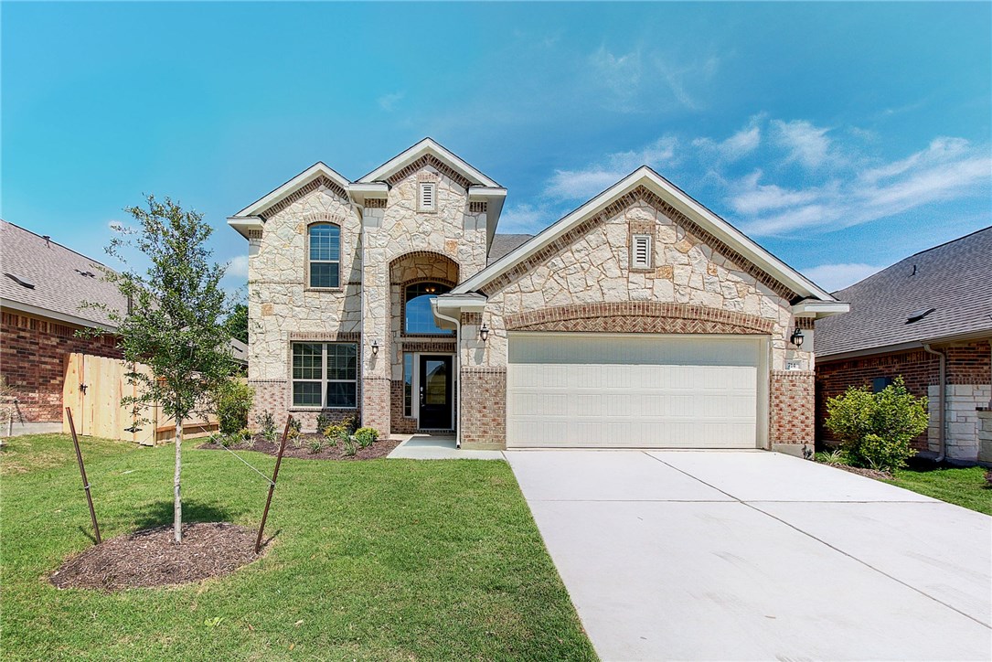 714 Allende Bend Austin, TX 78748 - Photo 1 of 1 a view of a house with a small yard and plants