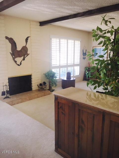 1088 Warwick Avenue Thousand Oaks, CA 91360 - Photo 6 of 11 a spacious bathroom with a granite countertop sink a large mirror and a potted plant