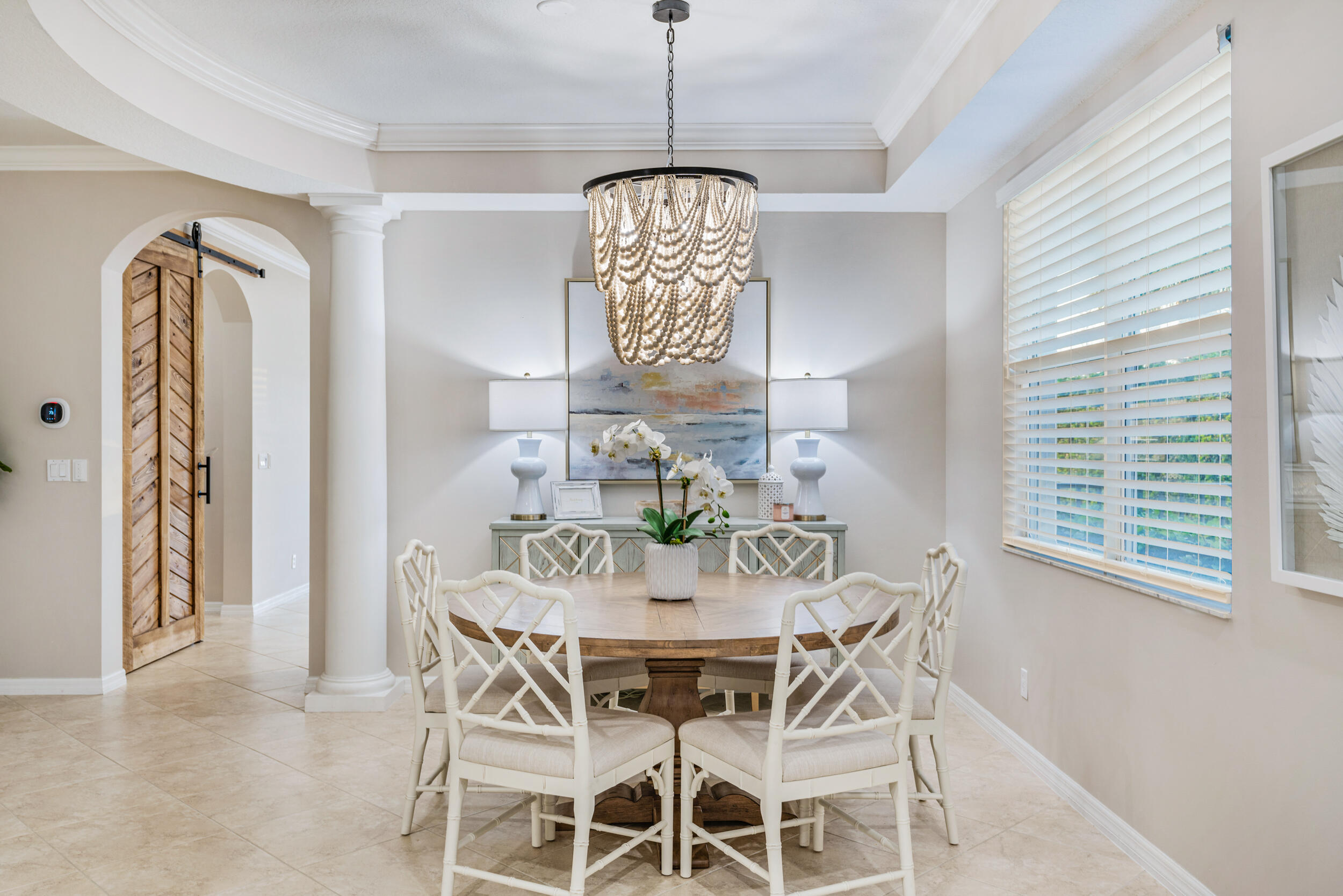 237 Porgee Rock Place Jupiter, FL 33458 - Photo 11 of 47 a view of a dining room with furniture and window