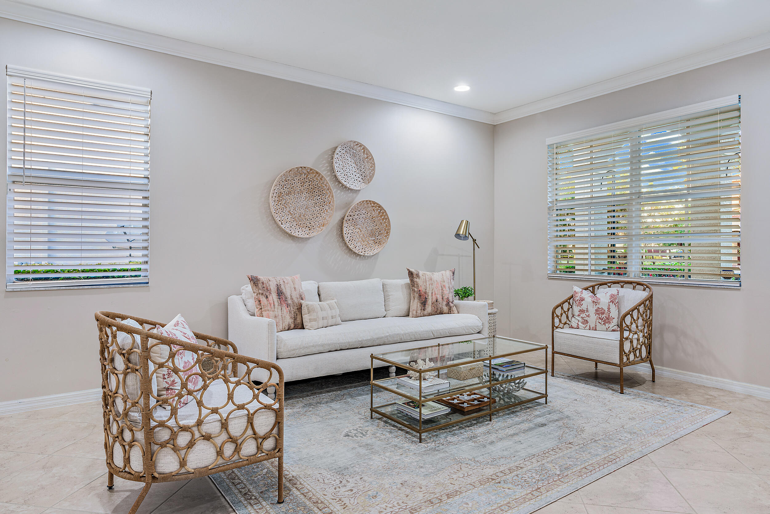 237 Porgee Rock Place Jupiter, FL 33458 - Photo 13 of 47 a living room with furniture a fireplace and a large window