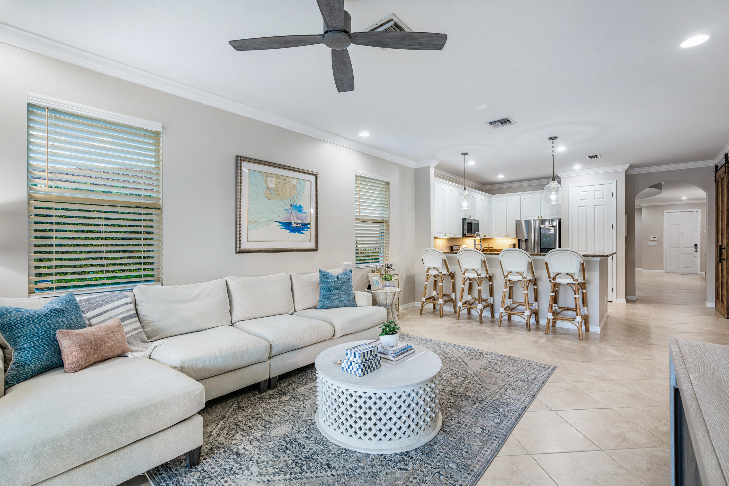 237 Porgee Rock Place Jupiter, FL 33458 - Photo 14 of 47 a living room with furniture and kitchen view