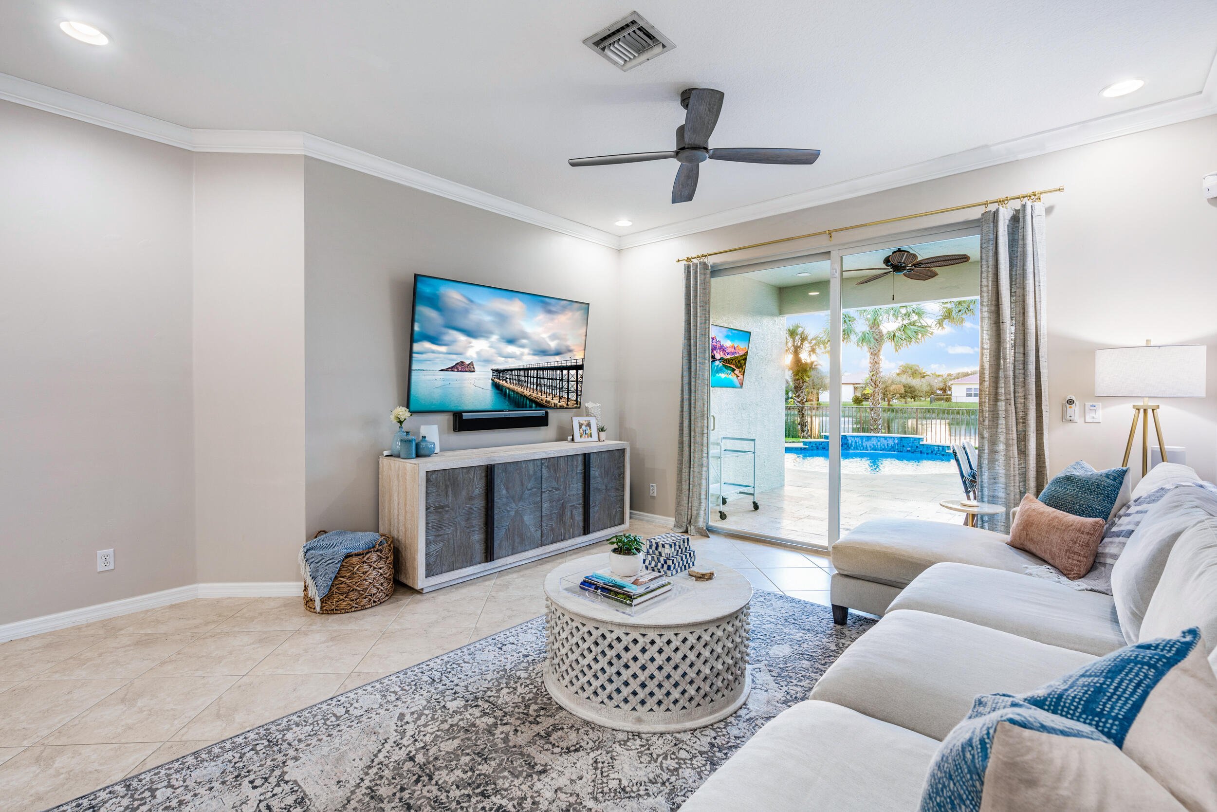 237 Porgee Rock Place Jupiter, FL 33458 - Photo 20 of 47 a living room with furniture and a flat screen tv