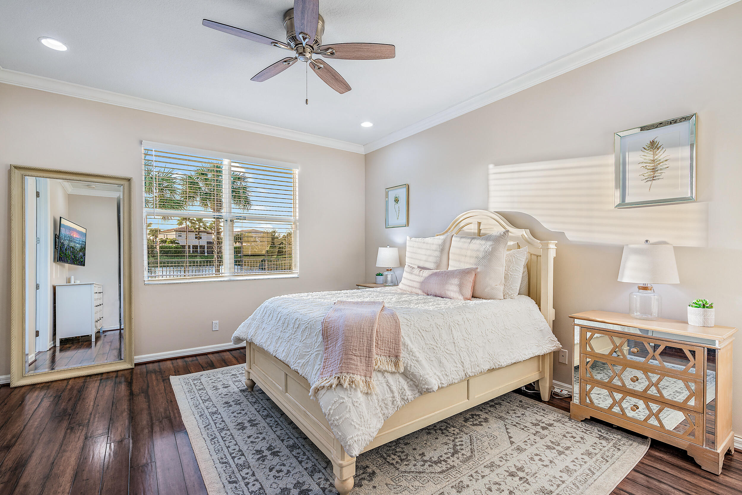 237 Porgee Rock Place Jupiter, FL 33458 - Photo 23 of 47 a bedroom with a large bed and a window