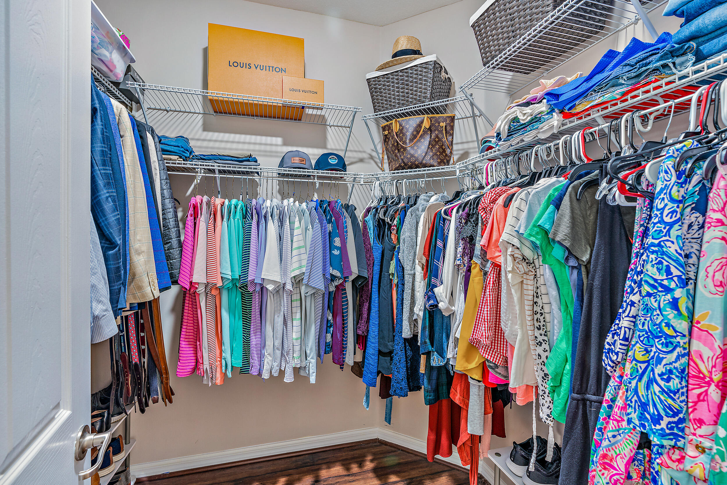 237 Porgee Rock Place Jupiter, FL 33458 - Photo 26 of 47 a view of walk in closet with clothes