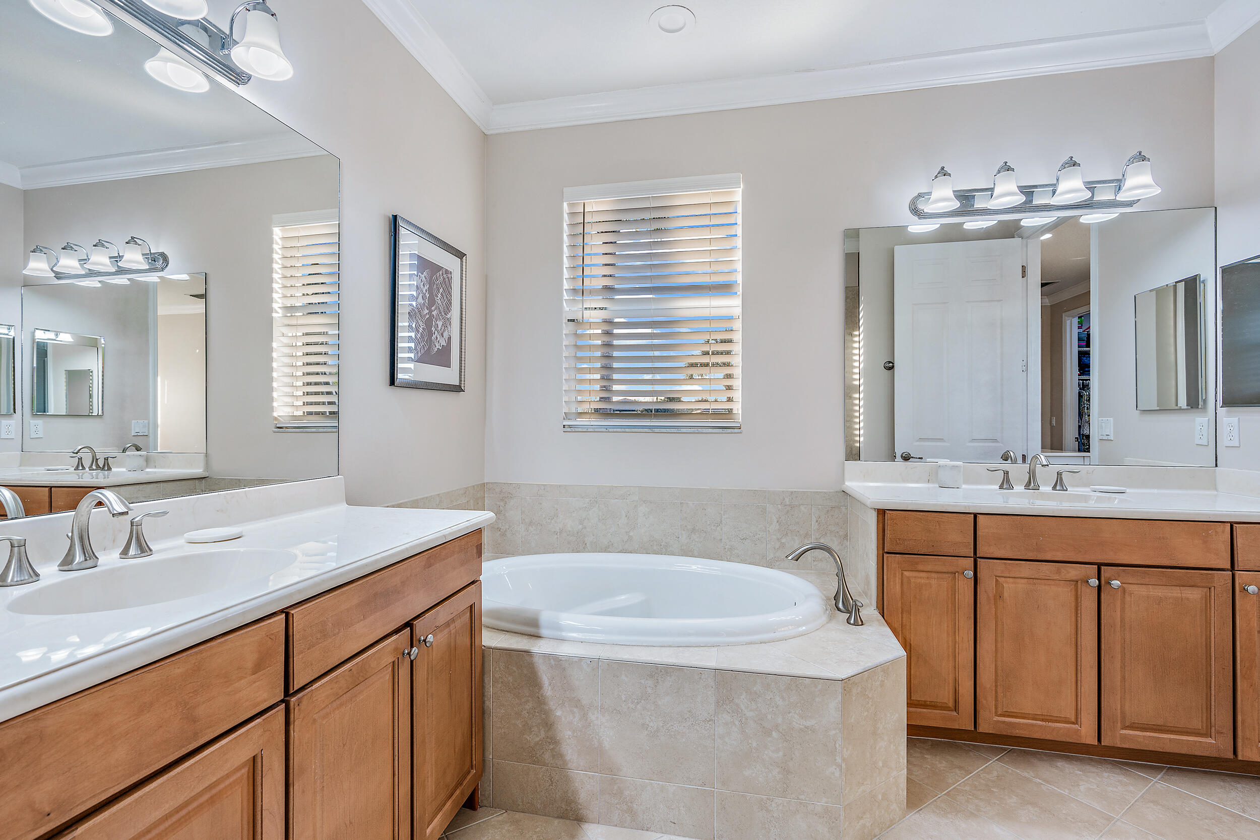 237 Porgee Rock Place Jupiter, FL 33458 - Photo 28 of 47 a bathroom with a sink double vanity and a mirror