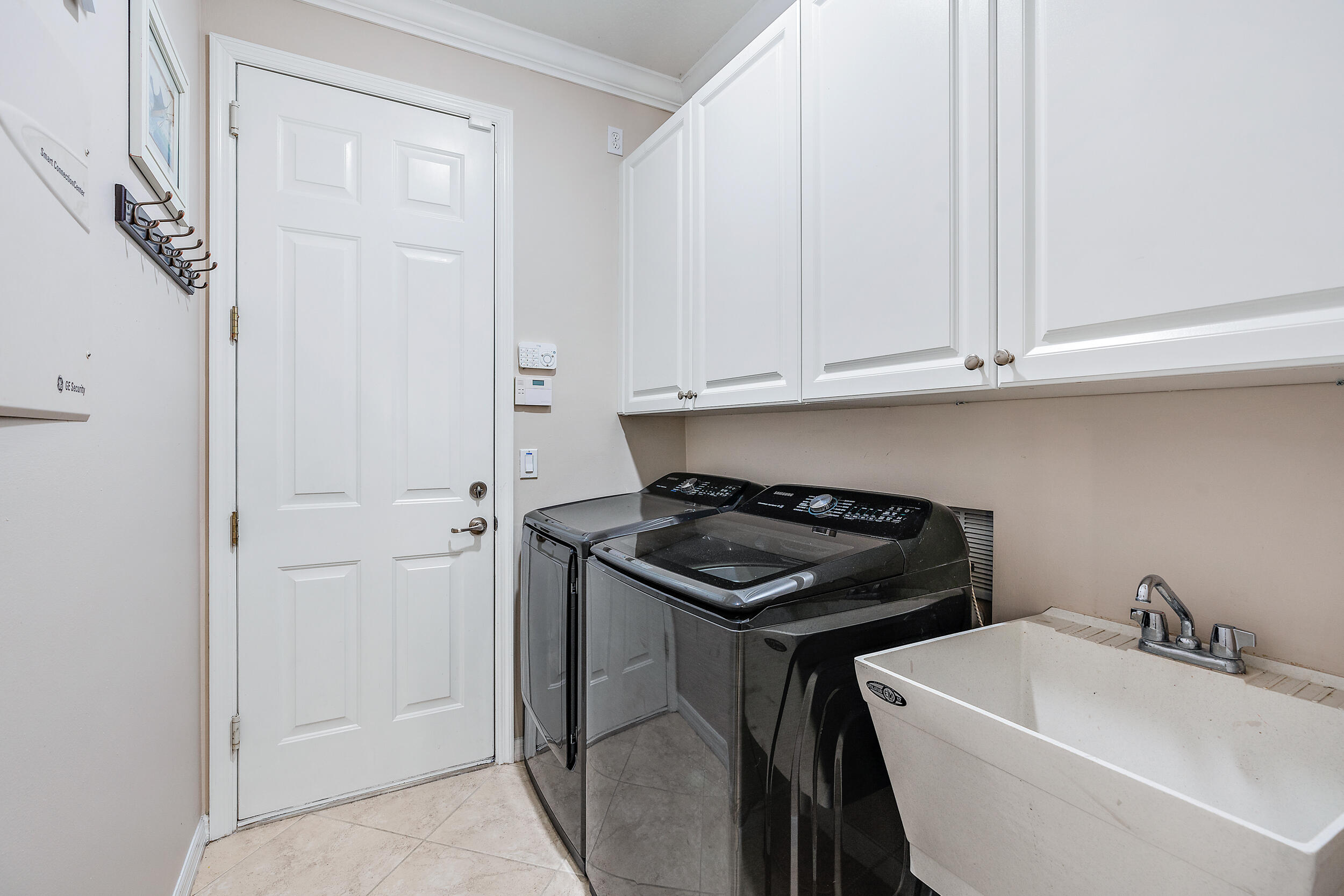 237 Porgee Rock Place Jupiter, FL 33458 - Photo 34 of 47 a kitchen with a sink and cabinets