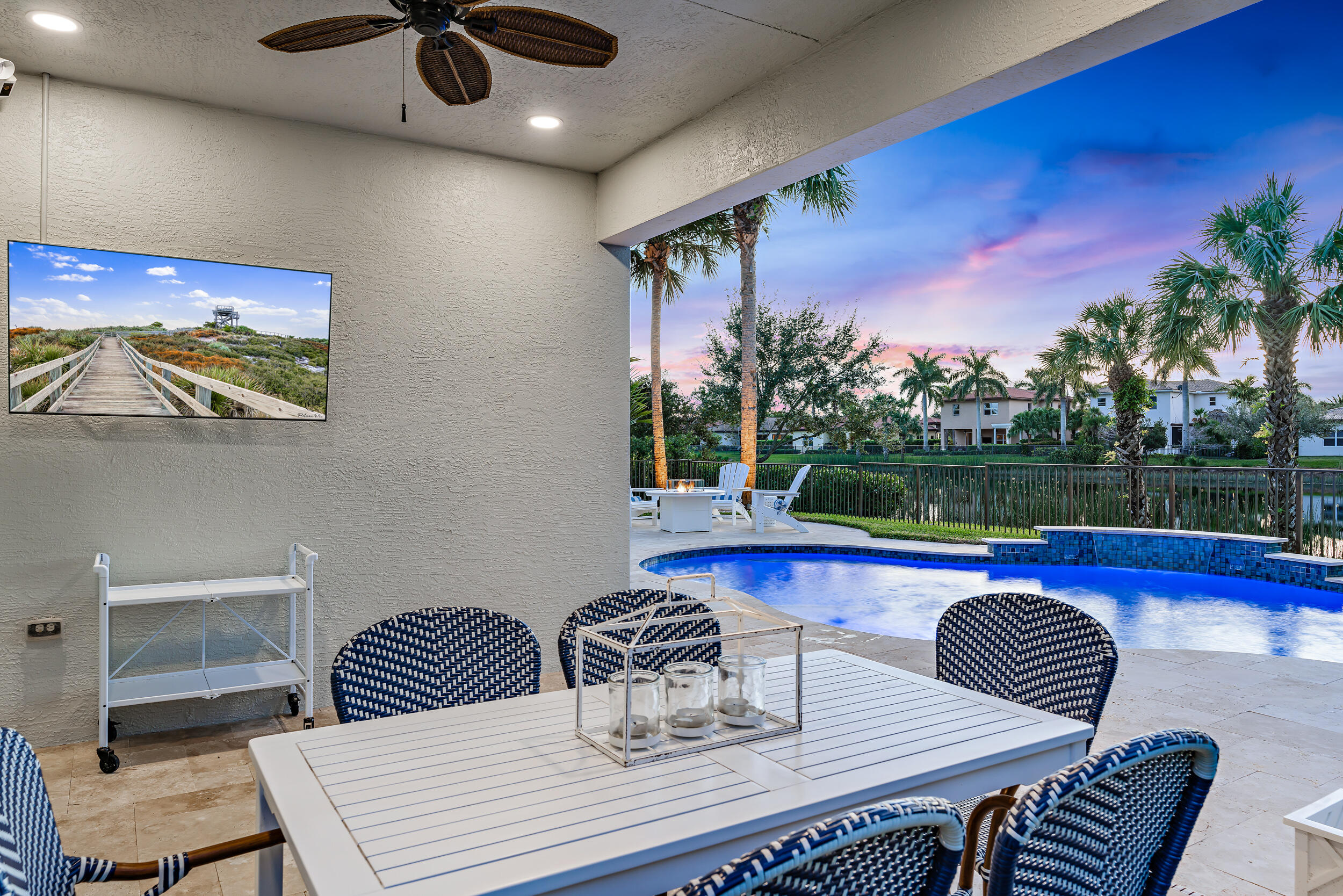 237 Porgee Rock Place Jupiter, FL 33458 - Photo 36 of 47 a view of a dining room with furniture window and wooden floor