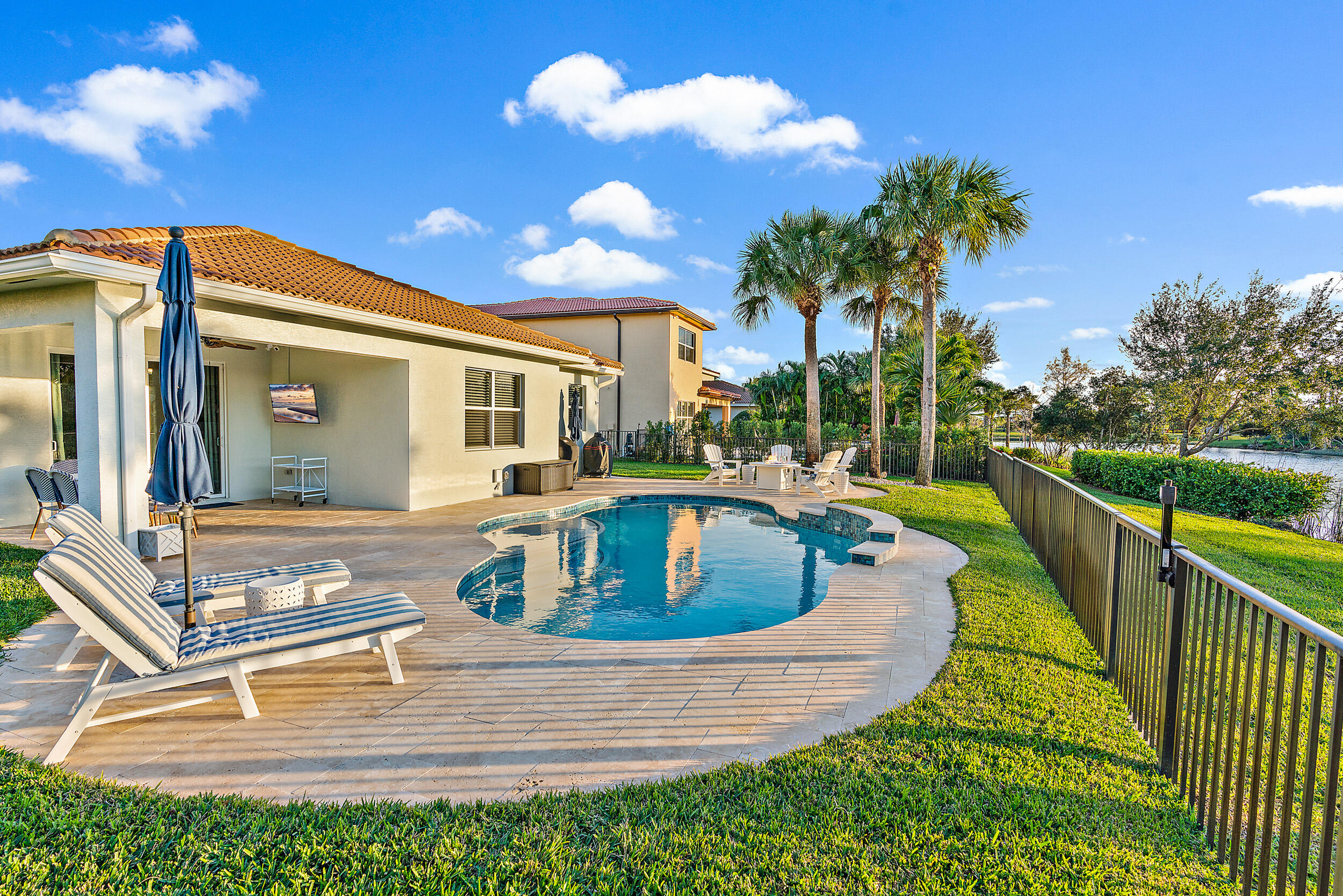 237 Porgee Rock Place Jupiter, FL 33458 - Photo 39 of 47 a view of a house with swimming pool