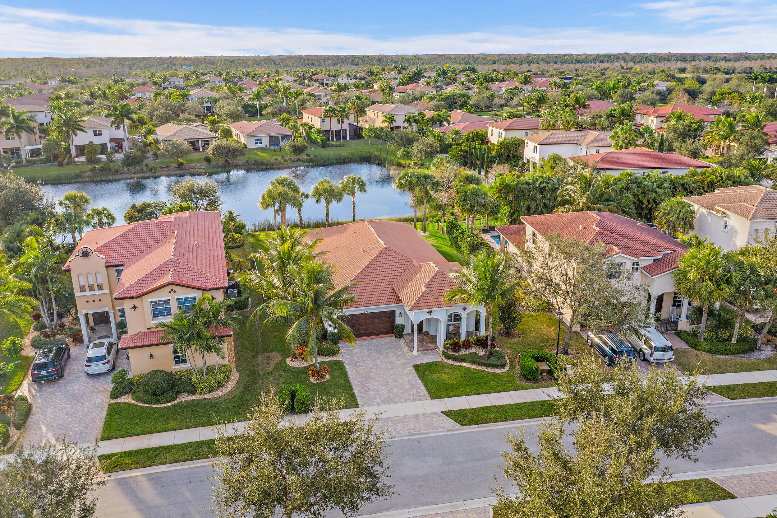 237 Porgee Rock Place Jupiter, FL 33458 - Photo 41 of 47 an aerial view of residential houses with outdoor space and lake view