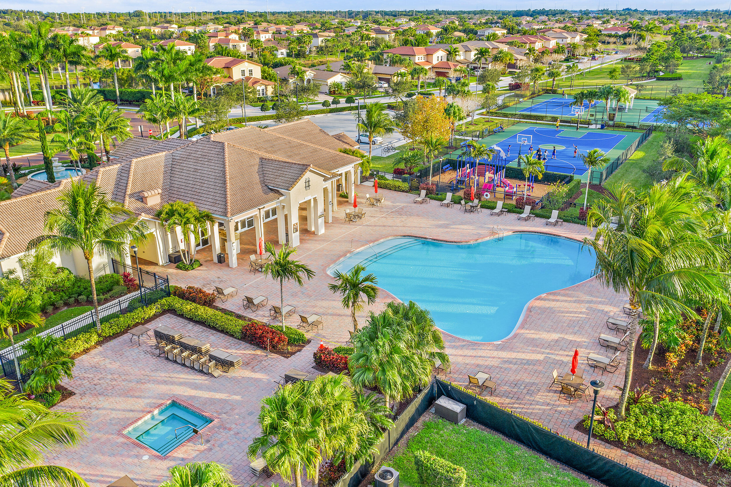 237 Porgee Rock Place Jupiter, FL 33458 - Photo 44 of 47 an aerial view of residential houses with outdoor space and swimming pool