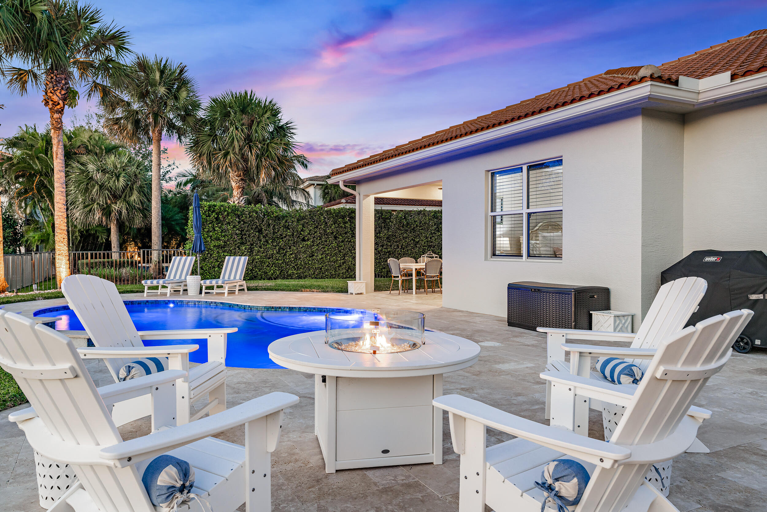 237 Porgee Rock Place Jupiter, FL 33458 - Photo 5 of 47 a view of a dinning table and chairs in the patio