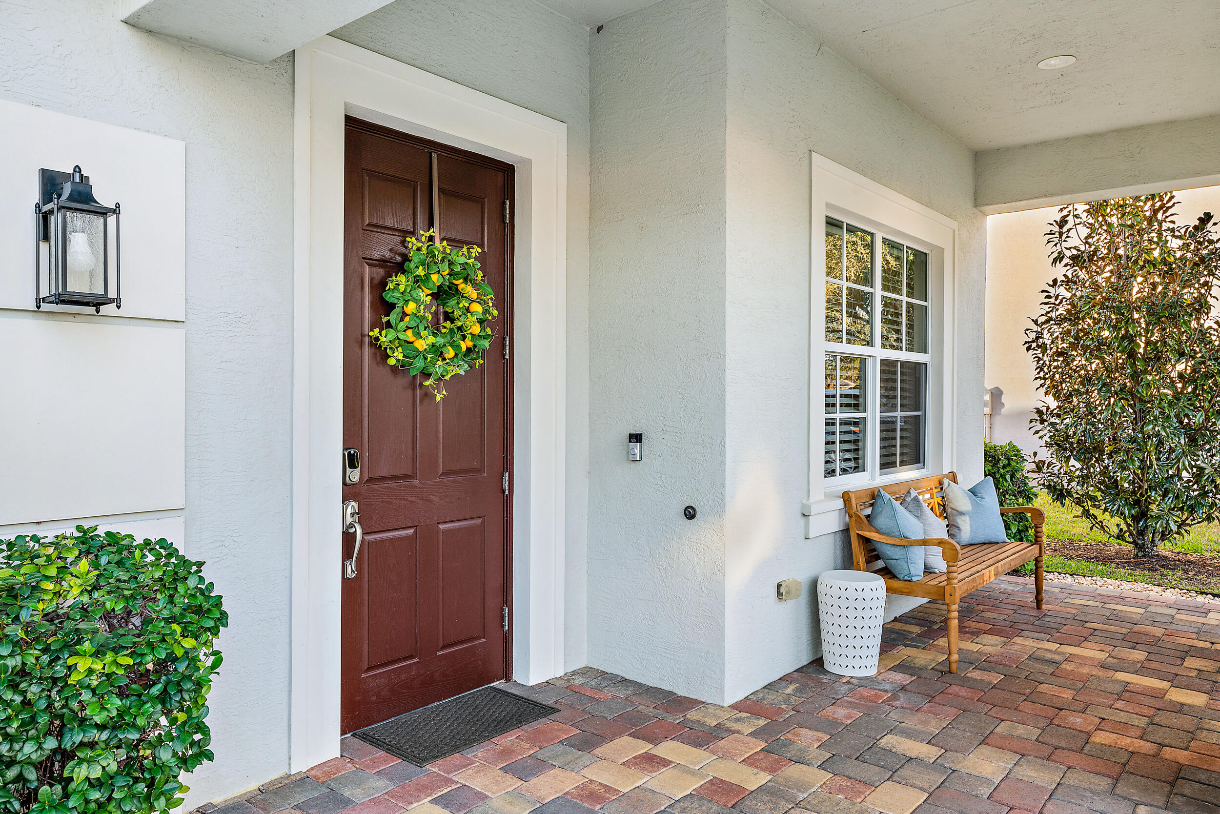 237 Porgee Rock Place Jupiter, FL 33458 - Photo 6 of 47 a outdoor space with patio couch and a potted plant