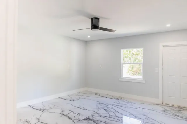 an empty room with windows