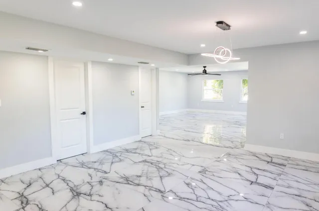 a view of an empty room and window