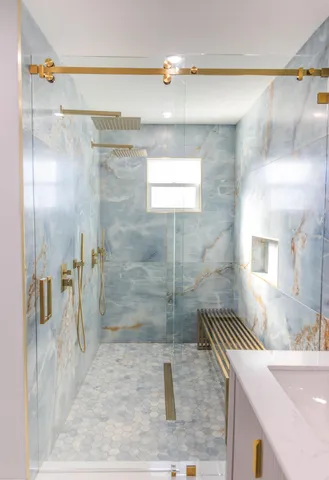 a bathroom with a sink and mirror