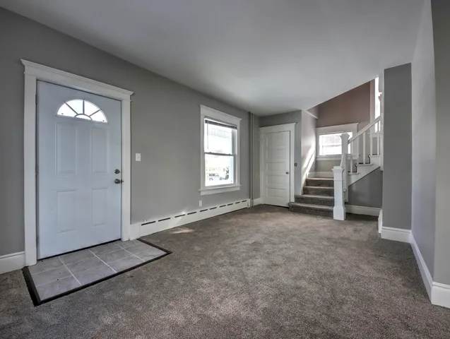 an empty room with windows