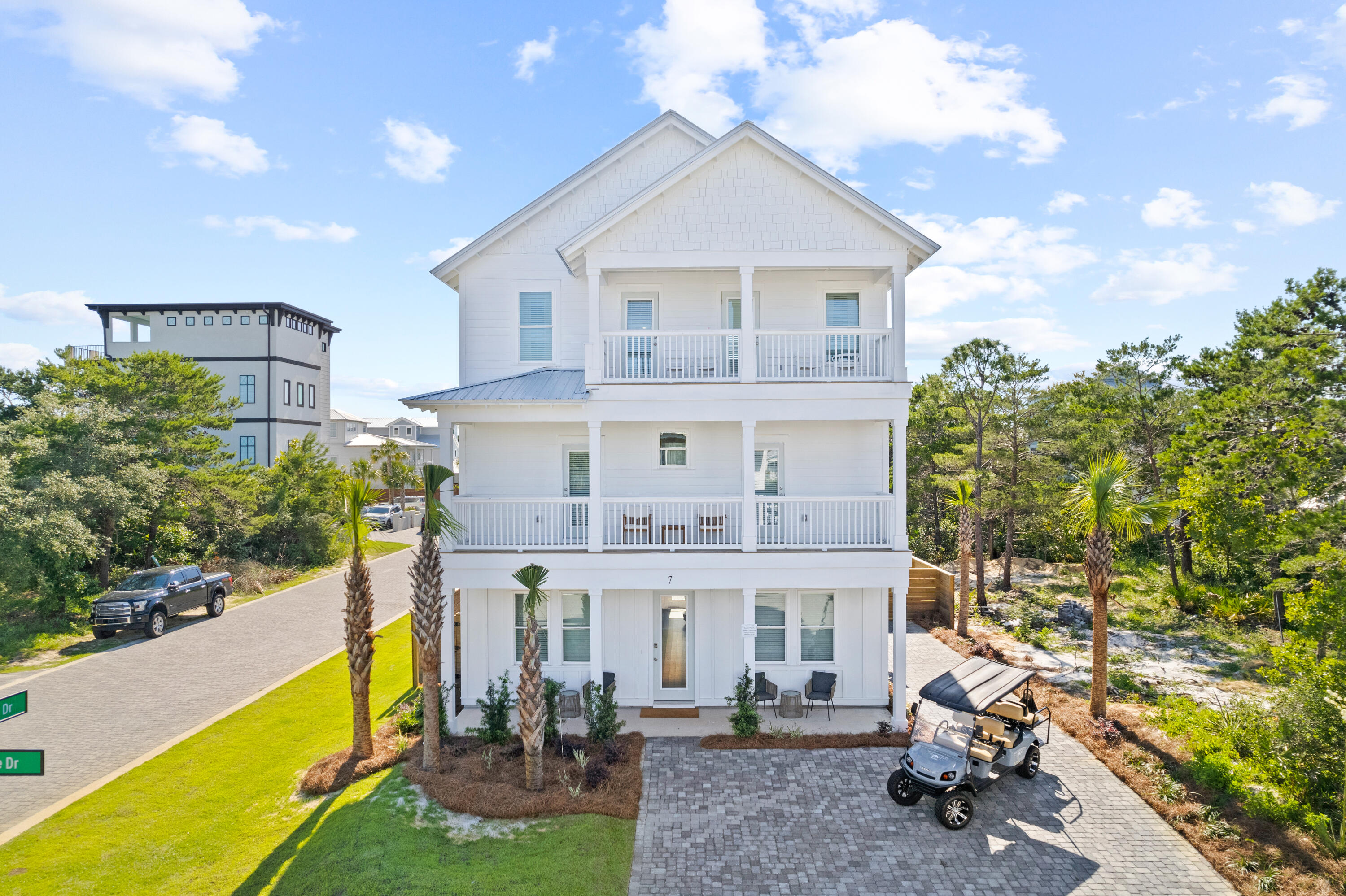 7 Lake Street Miramar Beach, FL 32550 - Photo 11 of 37 a view of a big house with a big yard and potted plants