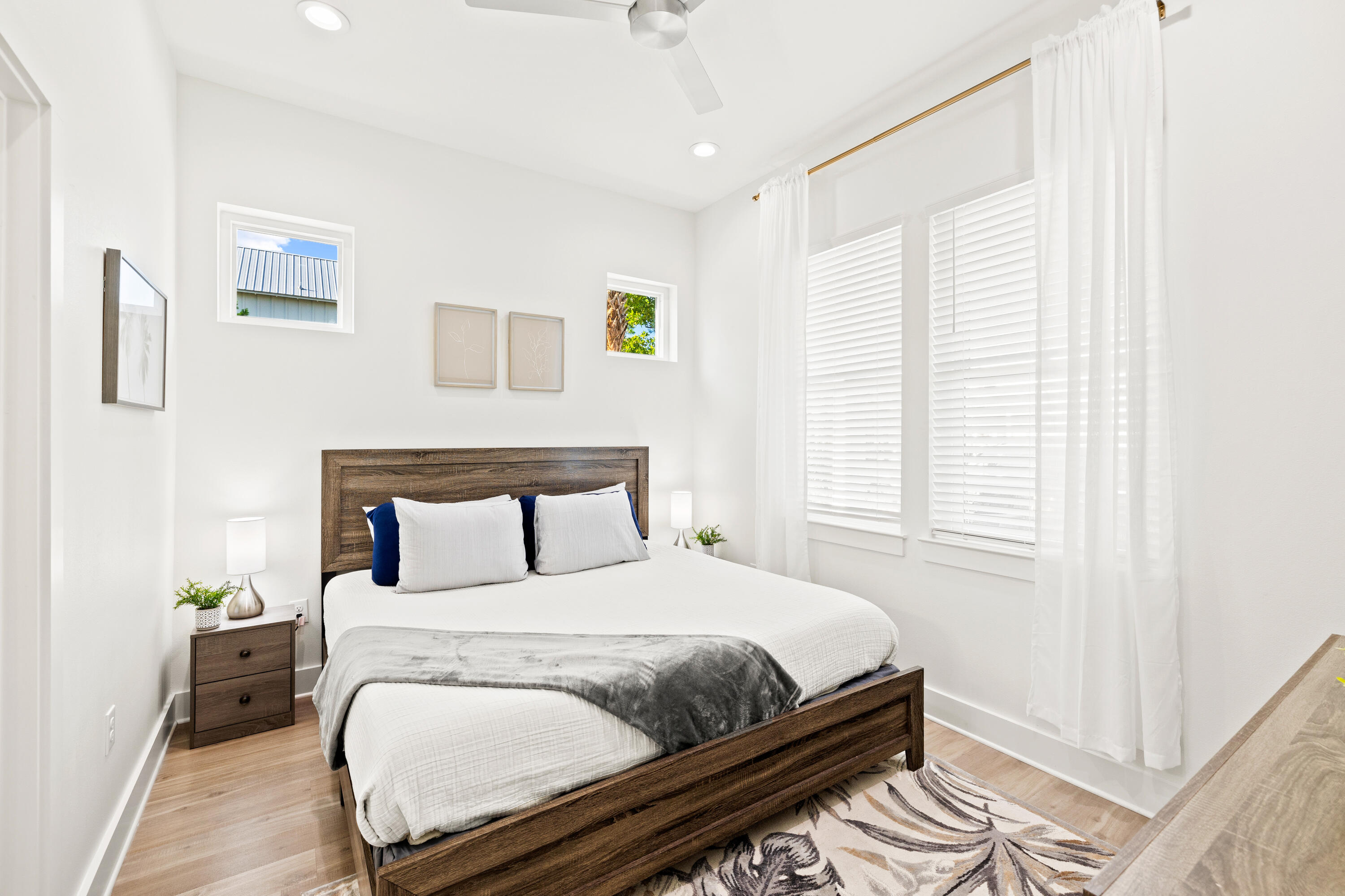 7 Lake Street Miramar Beach, FL 32550 - Photo 21 of 37 a bedroom with a bed and wooden floor