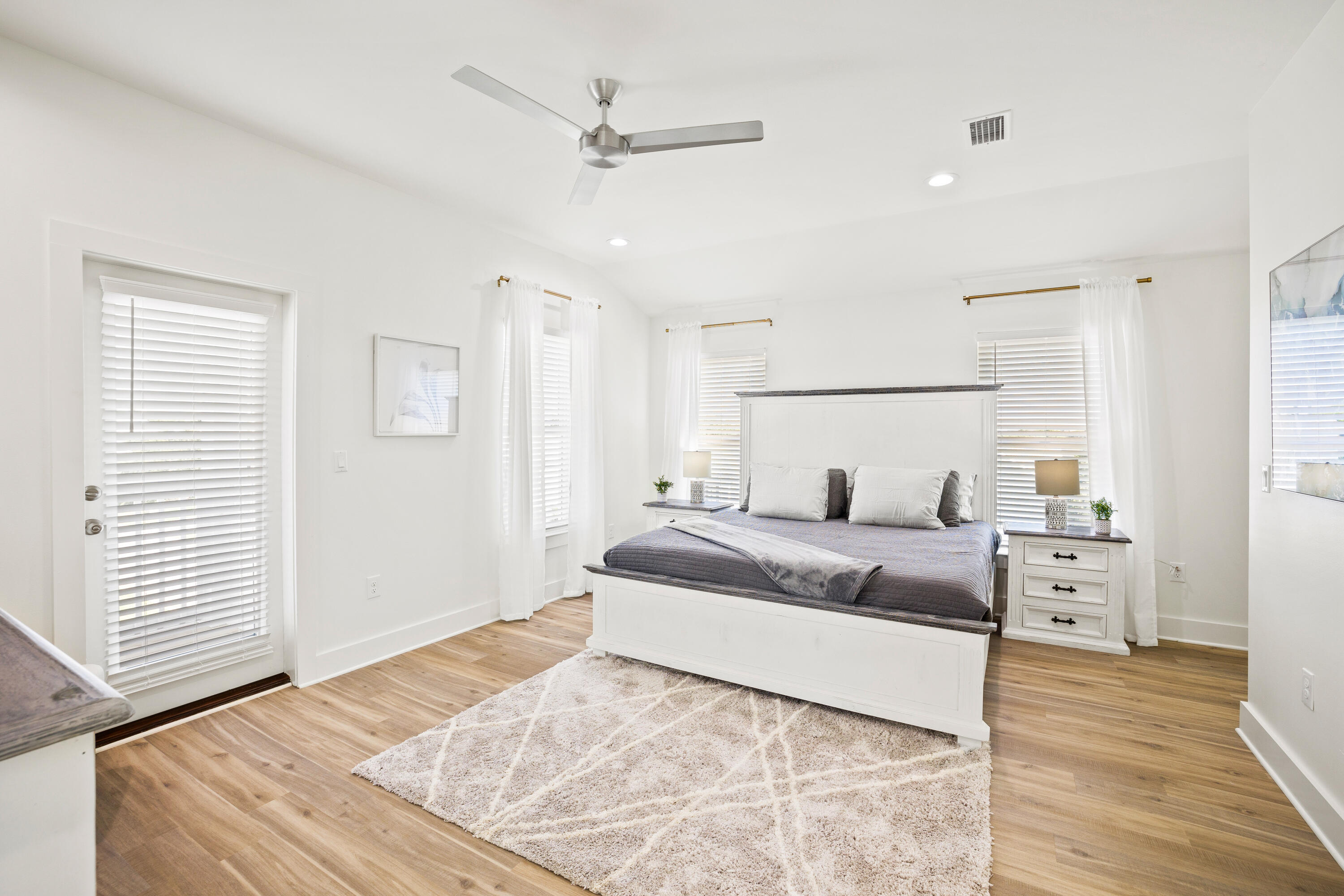 7 Lake Street Miramar Beach, FL 32550 - Photo 8 of 37 a bedroom with a bed and wooden floor