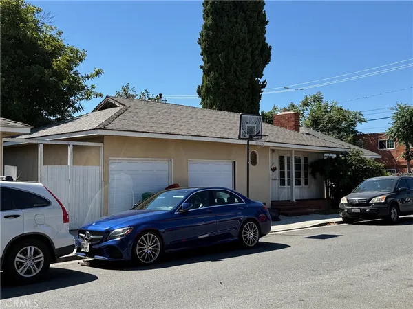 a car parked in front of a house