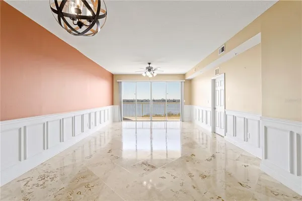 a view of an empty room and window