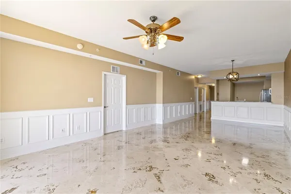 a view of a livingroom with a ceiling fan