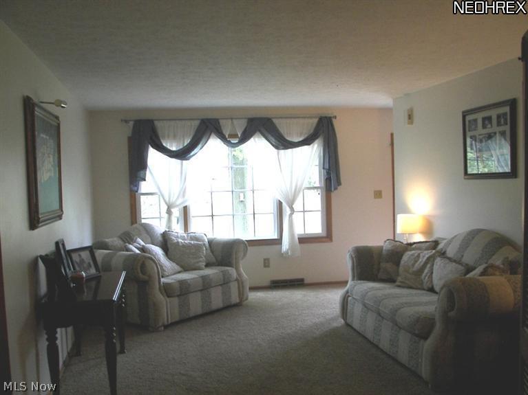 3282 Brenner Road Barberton, OH 44203 - Photo 11 of 24 Spacious Living Room with Newer Carpet.
