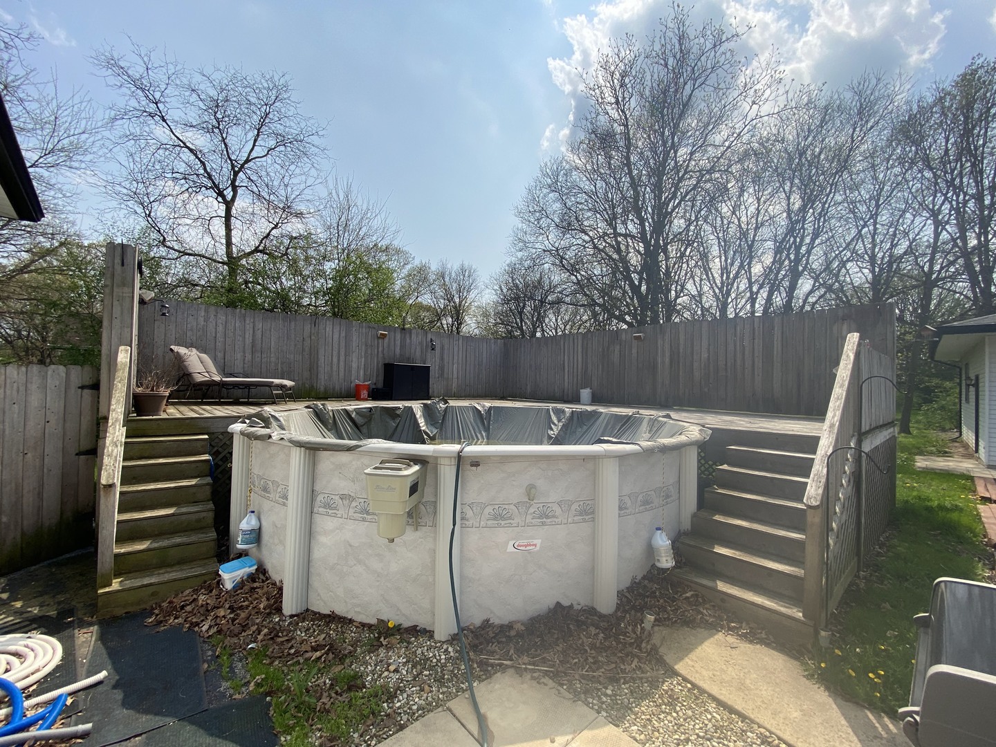 11270 Bell Road Lemont, IL 60439 - Photo 23 of 23 a view of a backyard with chairs and a fire pit