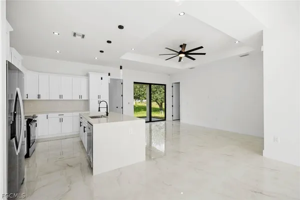 a view of cabinets and window