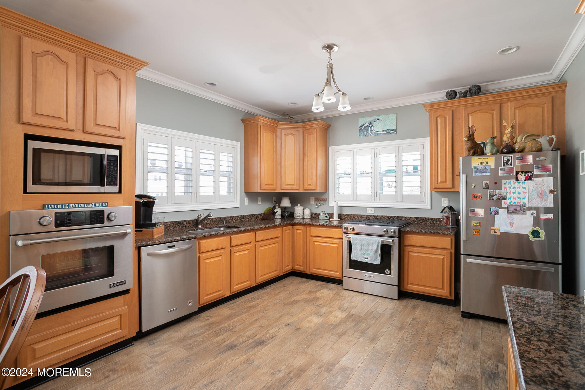 27 Sands Point Road Waretown, NJ 08758 - Photo 15 of 36 a kitchen with stainless steel appliances granite countertop a stove sink and microwave