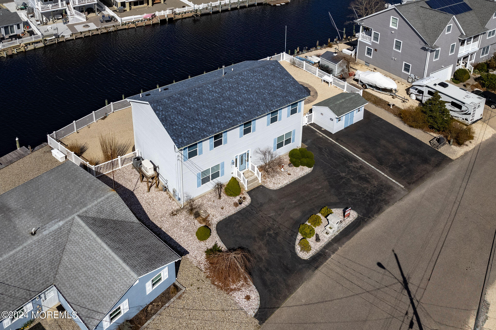 27 Sands Point Road Waretown, NJ 08758 - Photo 2 of 36 an aerial view of houses and outdoor space