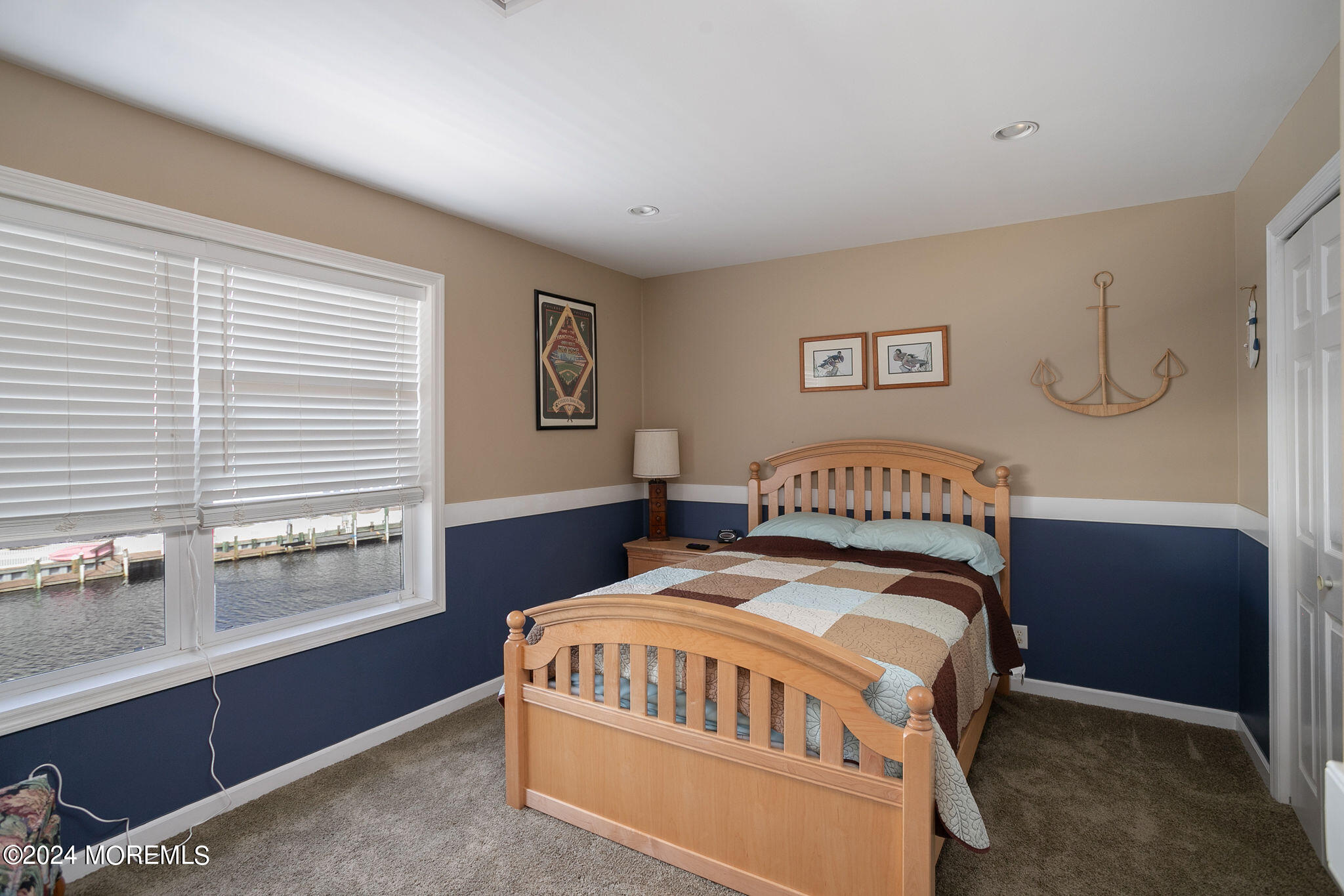 27 Sands Point Road Waretown, NJ 08758 - Photo 24 of 36 a bedroom with a bed and a window