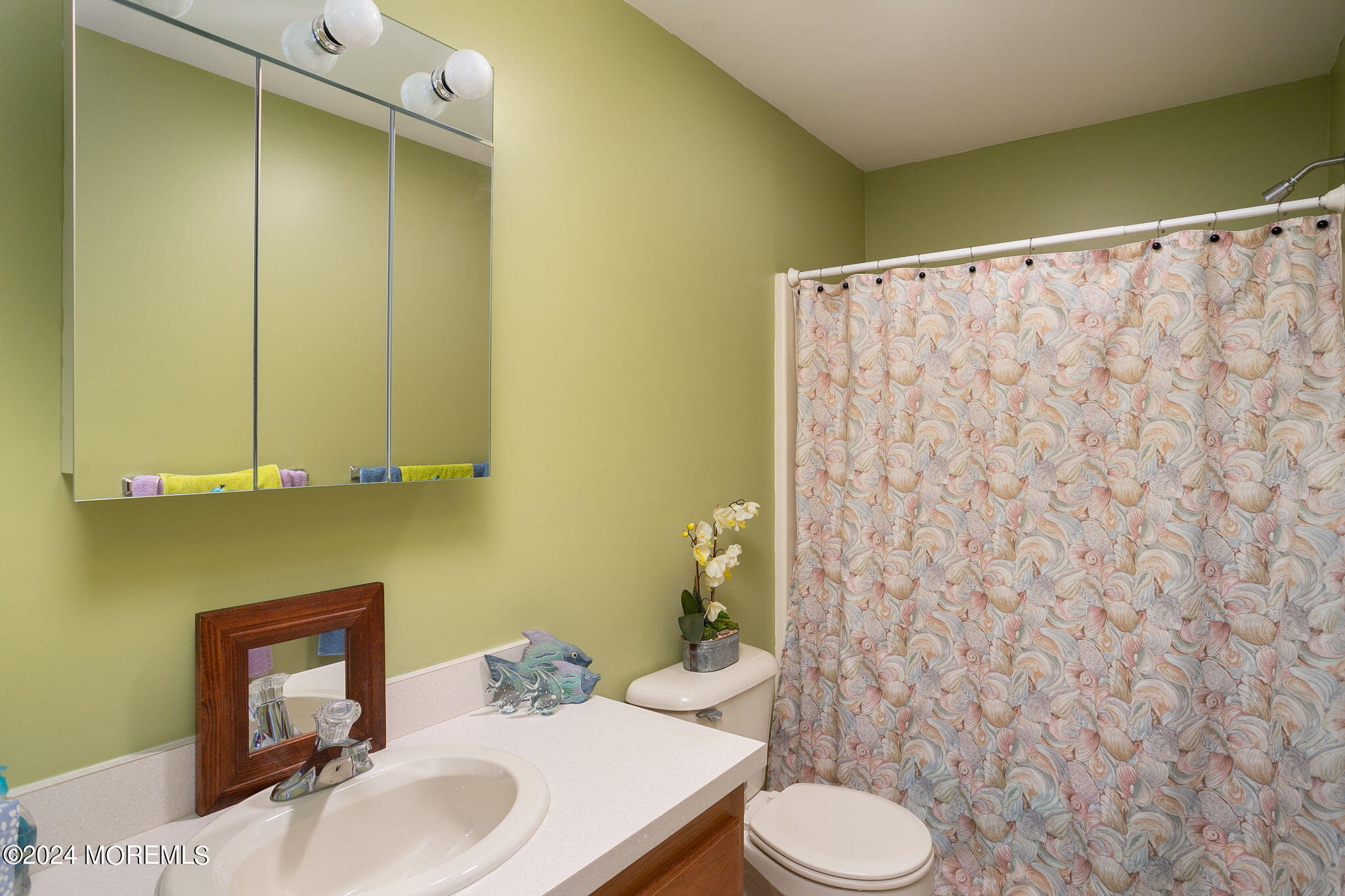 27 Sands Point Road Waretown, NJ 08758 - Photo 26 of 36 a bathroom with a sink and a toilet