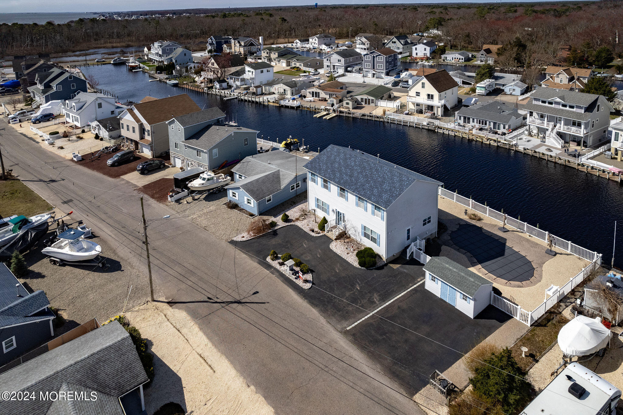 27 Sands Point Road Waretown, NJ 08758 - Photo 5 of 36 an aerial view of a house with parking space