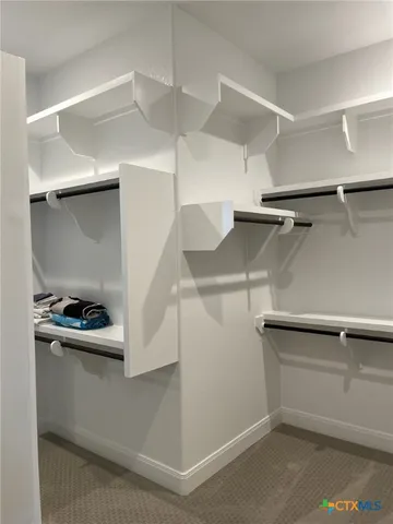 a room with storage and utility