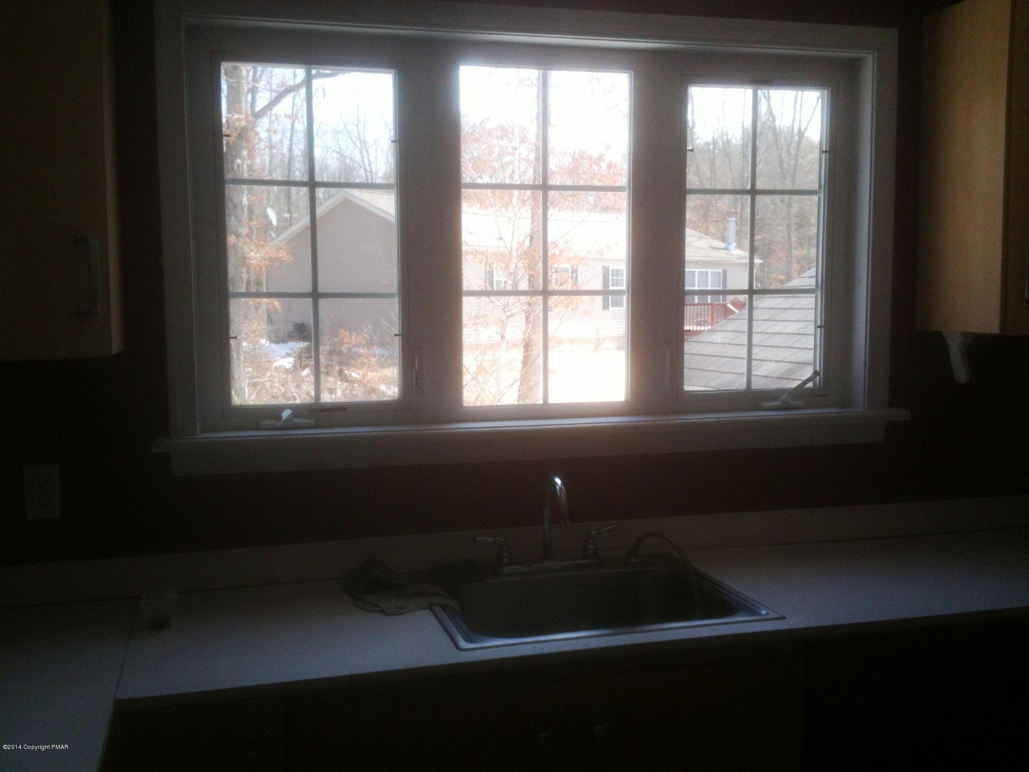 26 Lily Road East Stroudsburg, PA 18302 - Photo 18 of 48 a room that has a window in it