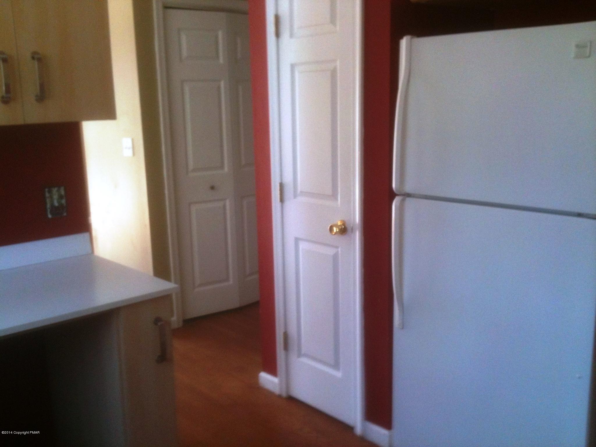 26 Lily Road East Stroudsburg, PA 18302 - Photo 19 of 48 a view of cabinet with wooden floor