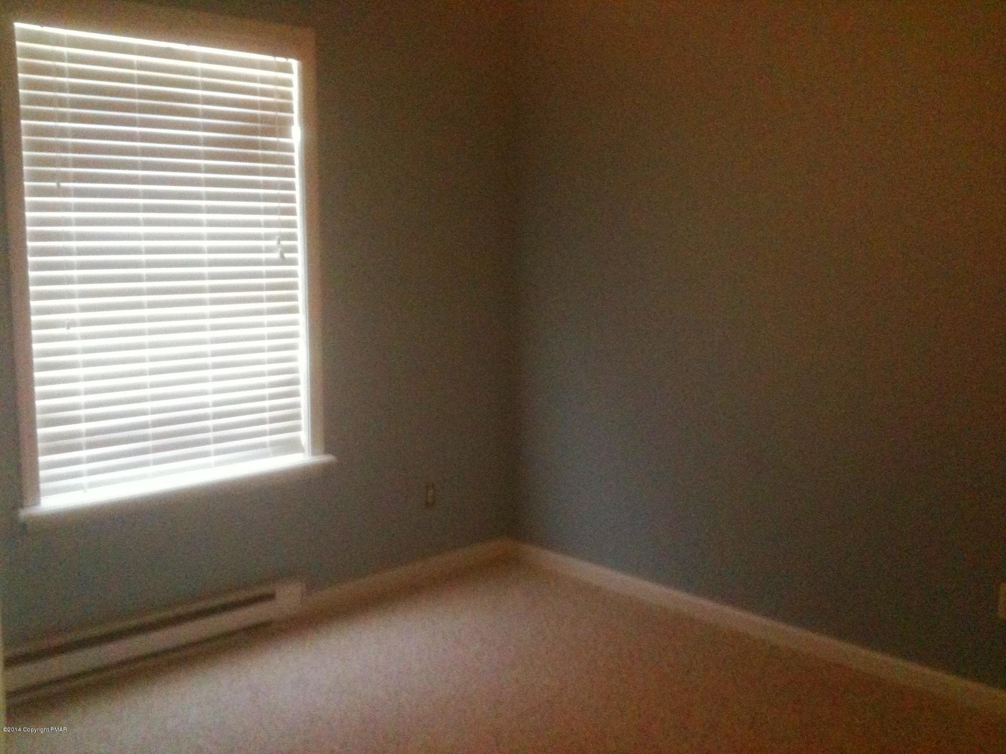 26 Lily Road East Stroudsburg, PA 18302 - Photo 20 of 48 a room that has a window in it